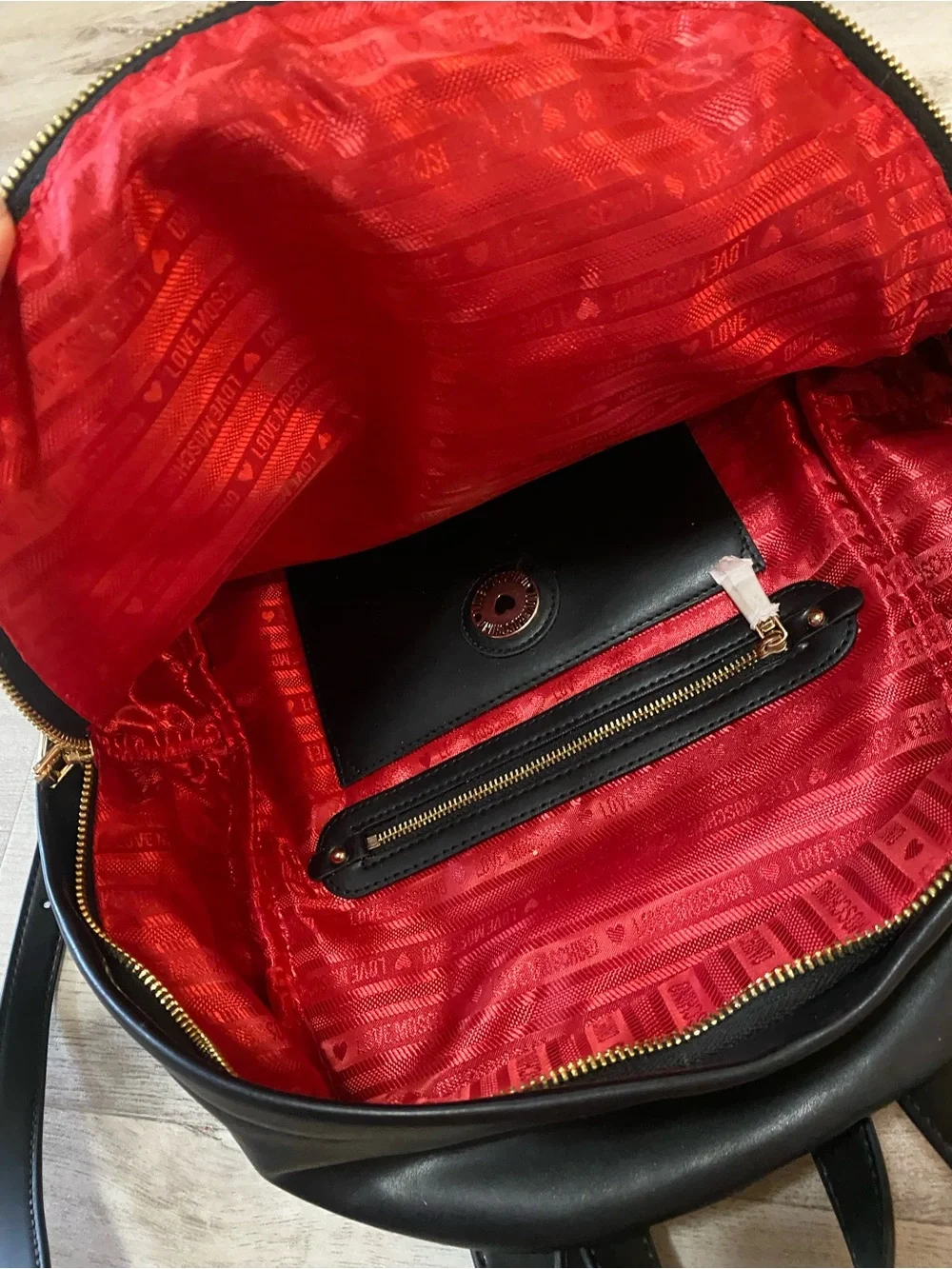 Love Moschino Black Backpack with Gold Logo and Red Tassel